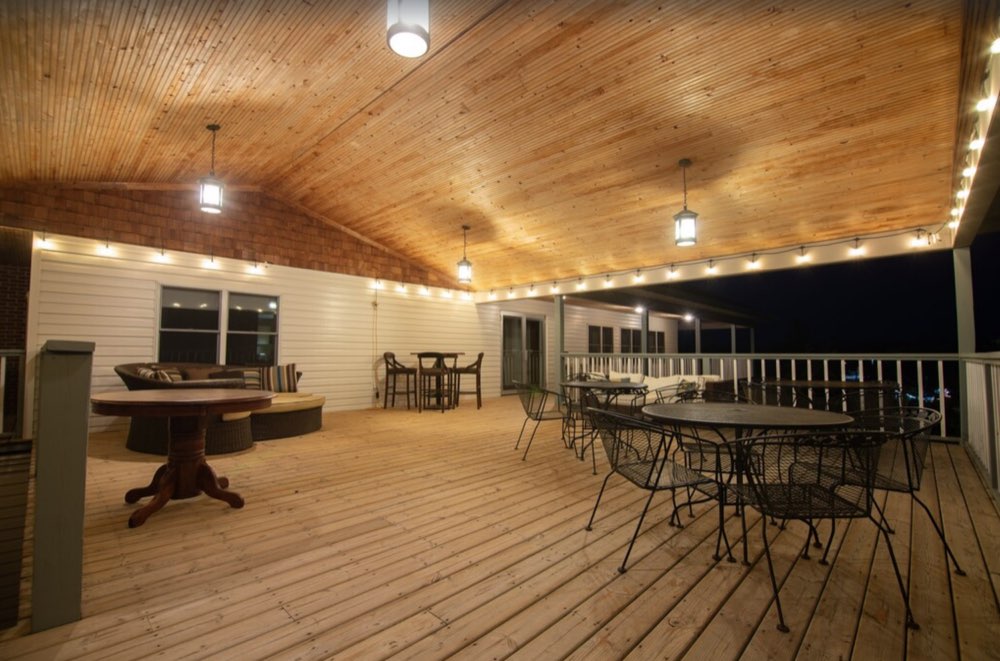 Tables and chairs on the covered deck