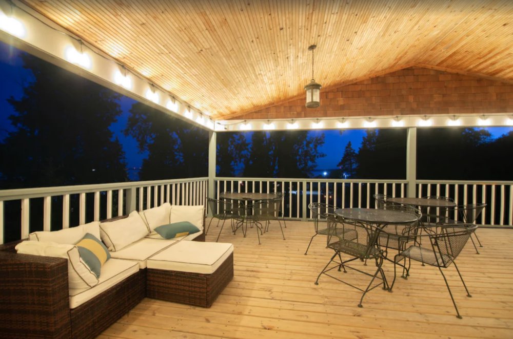 Lounge seating on the deck at night
