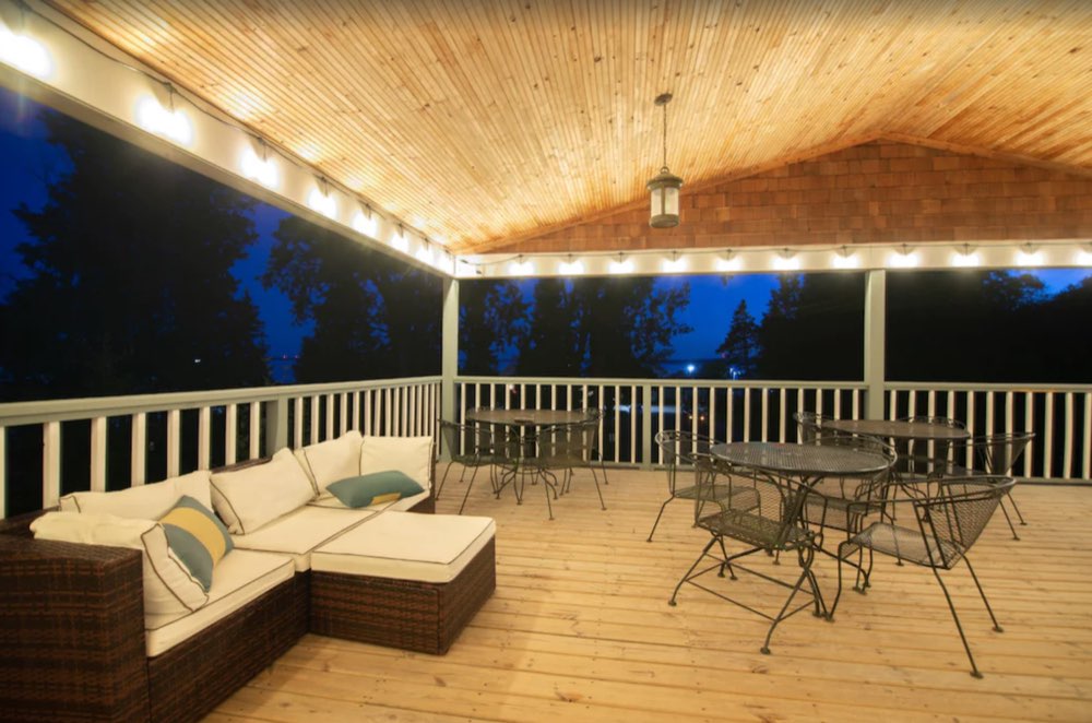 Lounge seating on the deck at night
